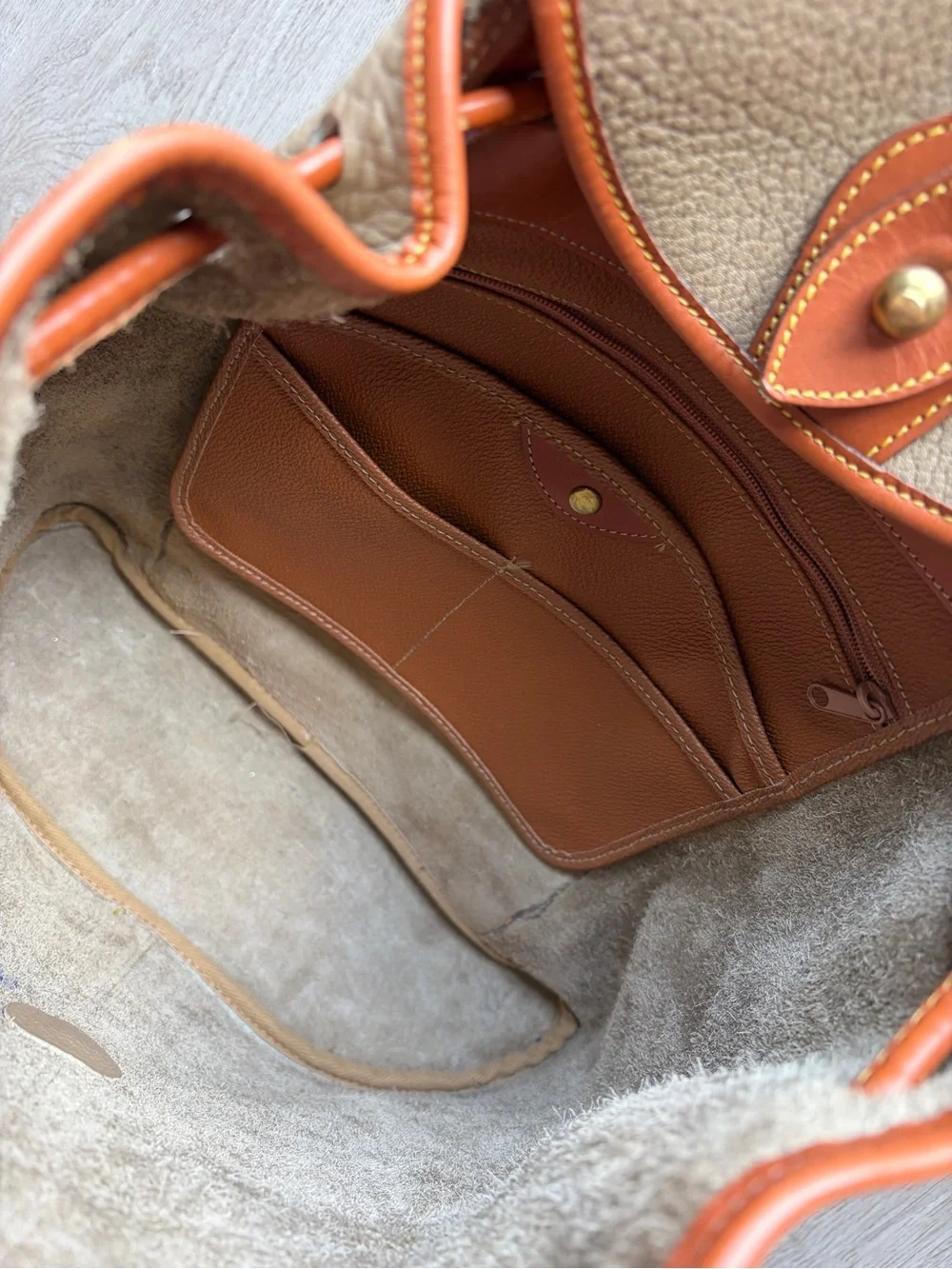 Dooney & Bourke Beige Leather Drawstring Backpack with Tan Trim